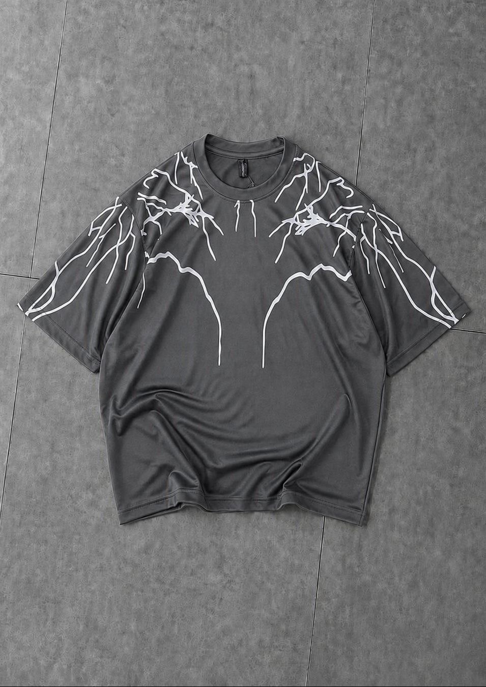 Grey oversized t-shirt with stylish lightning design for casual wear